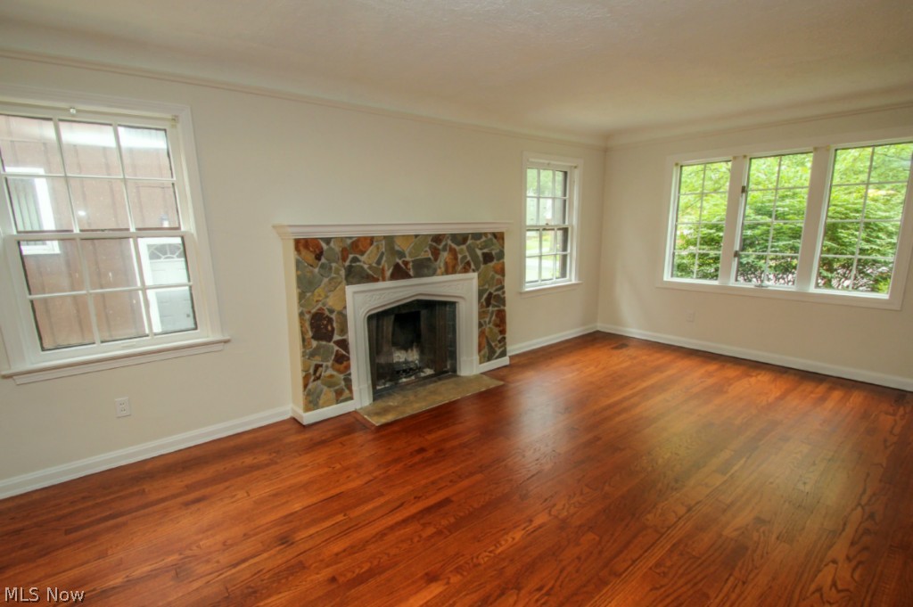 1917 Staunton Road Cleveland Heights, OH 44118 - Photo 3 of 19 19X13 Living Room w/wood burning fireplace & hardwood floors