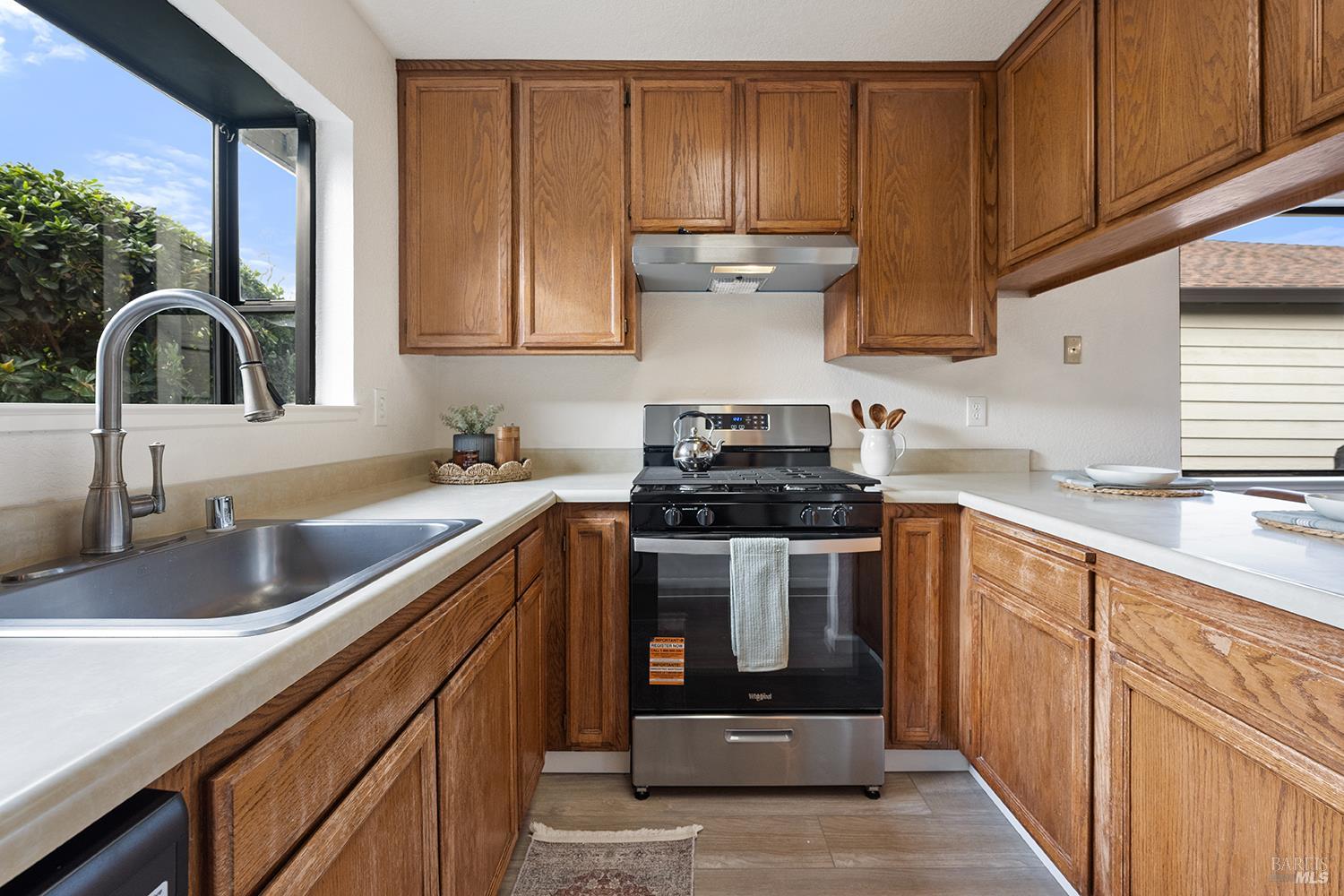 1733 Burgundy Place Santa Rosa, CA 95403 - Photo 4 of 23 The kitchen is bright and easily accessible from the front door.