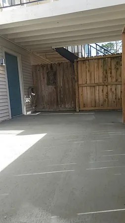 a view of a balcony with an outdoor space