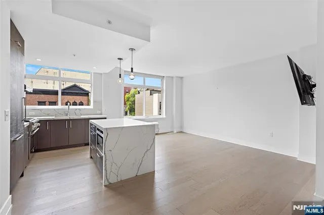a kitchen with a cabinets and counter space