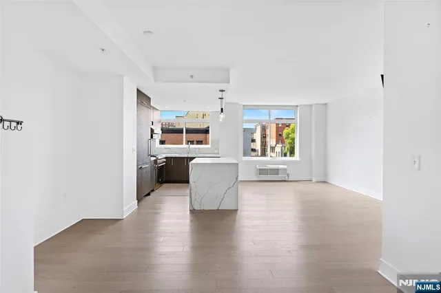 a view of a kitchen with furniture and window