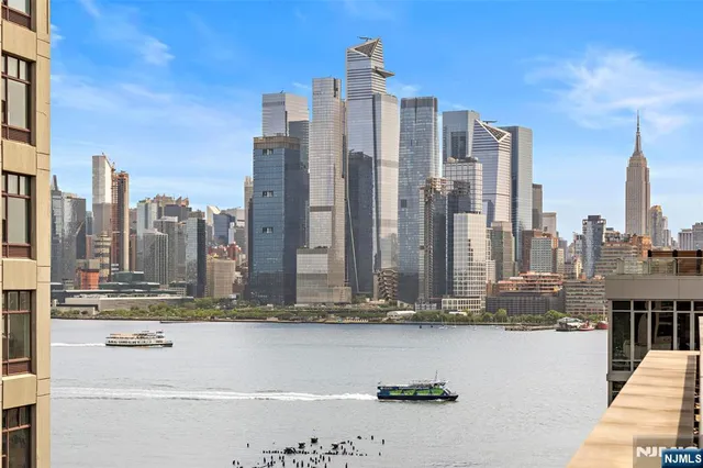 a view of a city with tall buildings