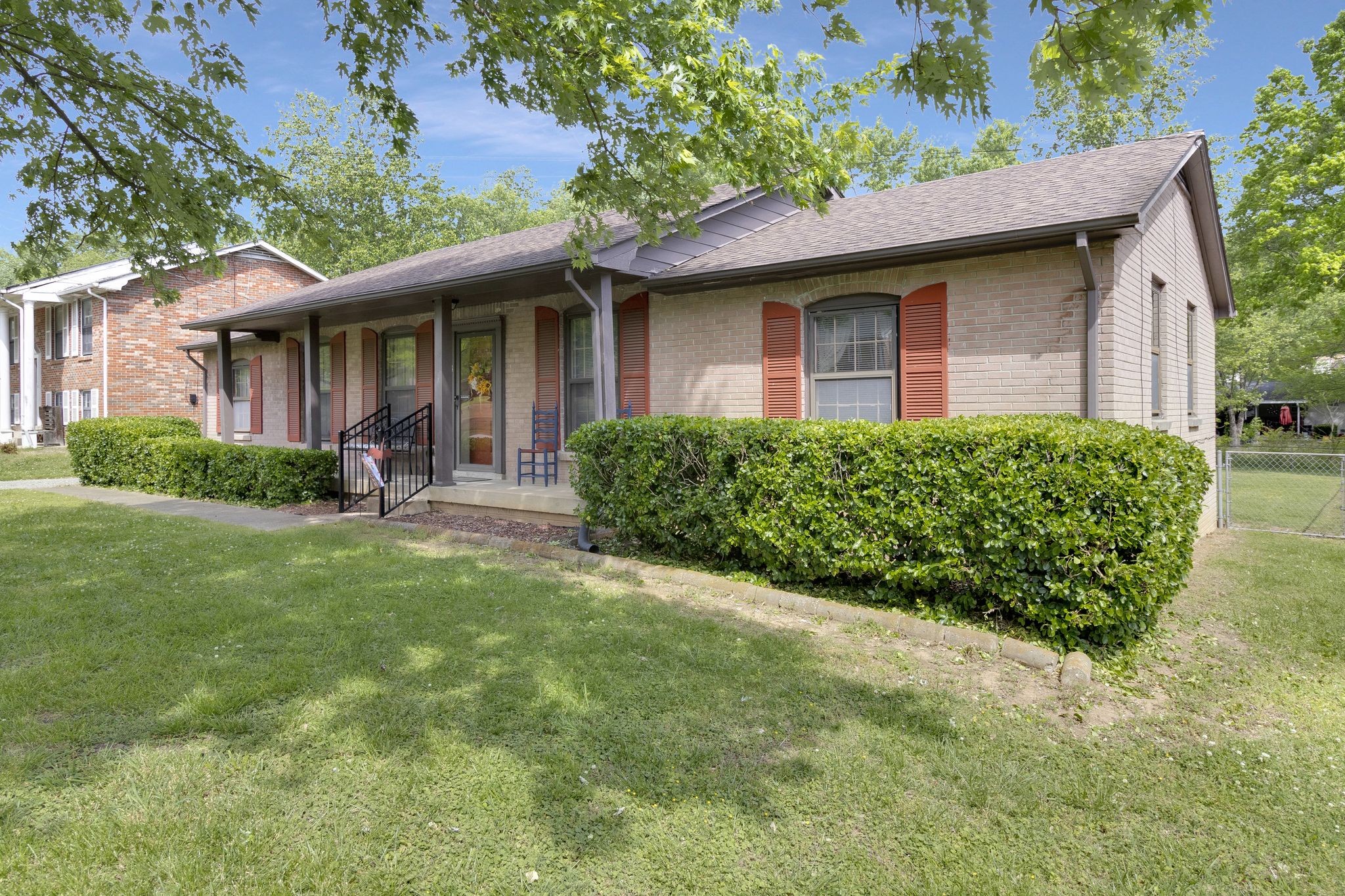 64 Benzing Road Antioch, TN 37013 - Photo 4 of 26 a front view of a house with garden