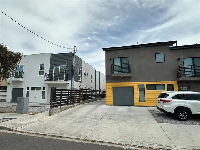 a front view of a house with a garage
