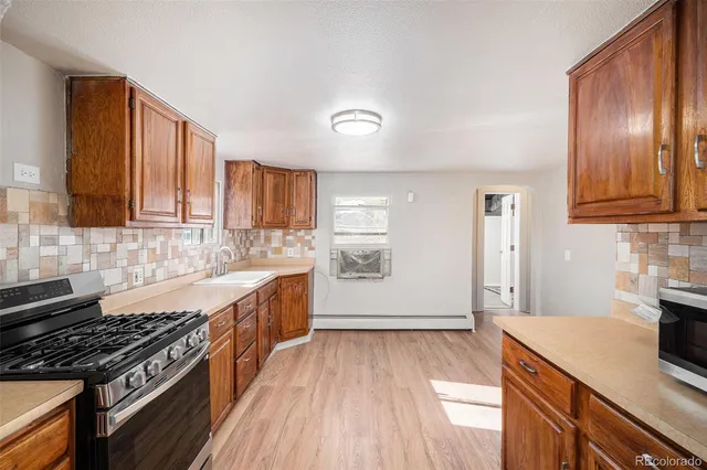 $449,900 | 2801 West Dartmouth Avenue, Denver, CO 80236