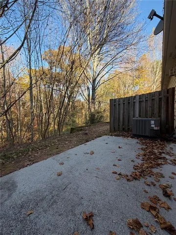 a view of a backyard of the house