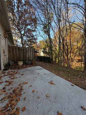 a view of backyard and tree