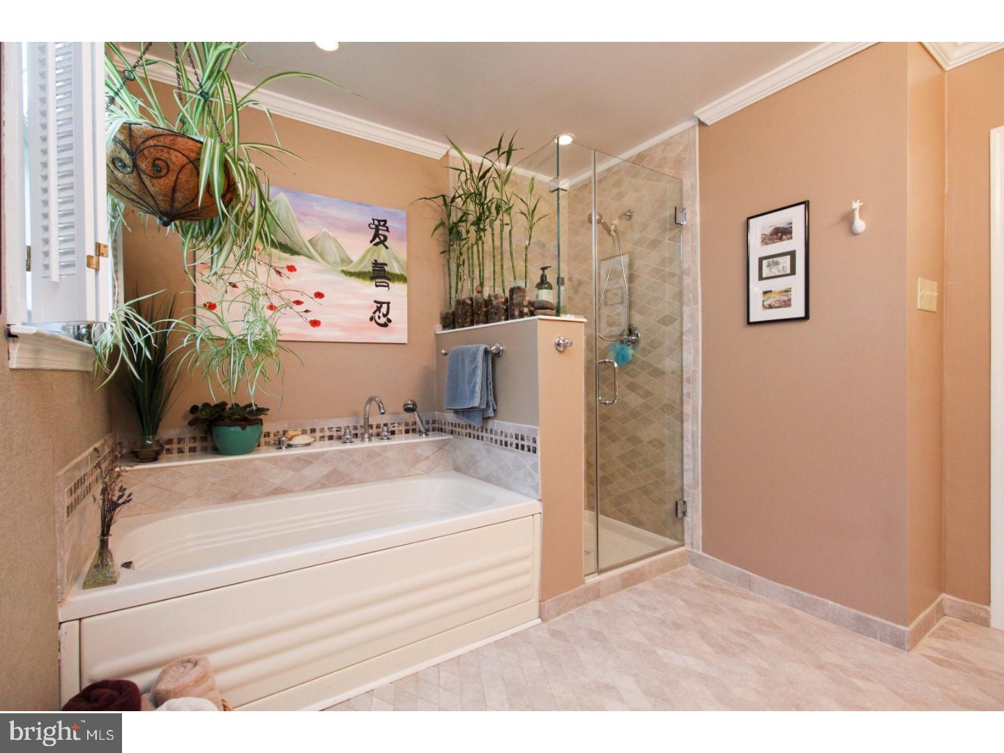 101 Greenvale Road Cherry Hill, NJ 08034 - Photo 18 of 25 a bathroom with a bathtub and a shower