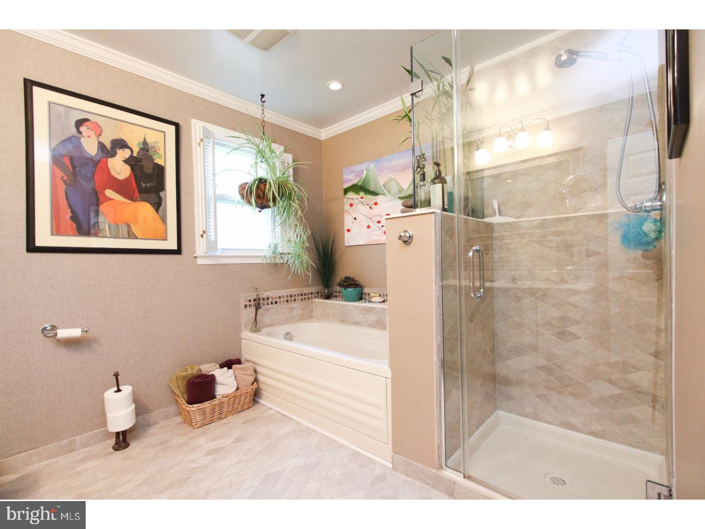 101 Greenvale Road Cherry Hill, NJ 08034 - Photo 19 of 25 a bathroom with a tub sink and mirror