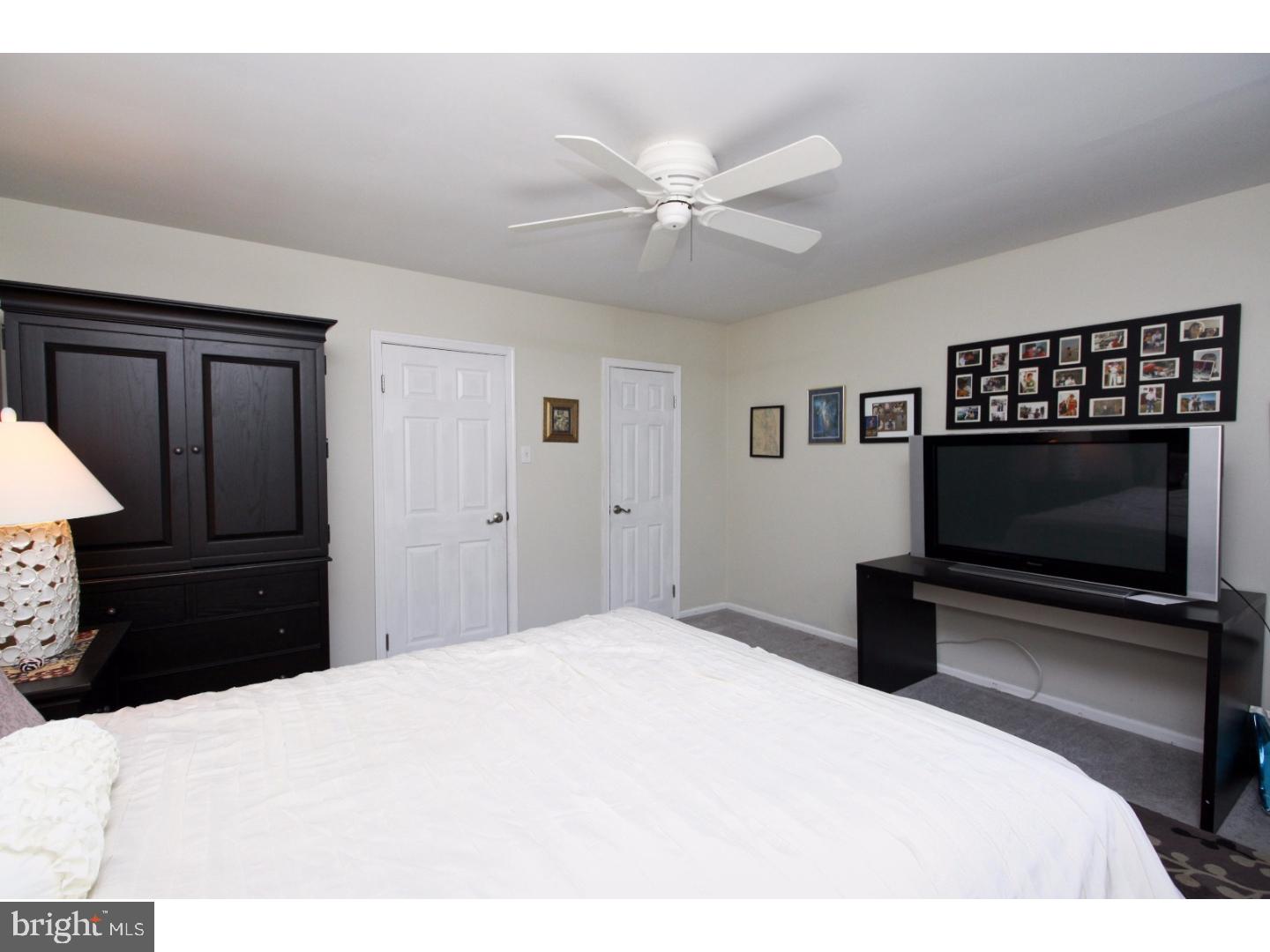 101 Greenvale Road Cherry Hill, NJ 08034 - Photo 21 of 25 a bedroom with a bed and a flat screen tv