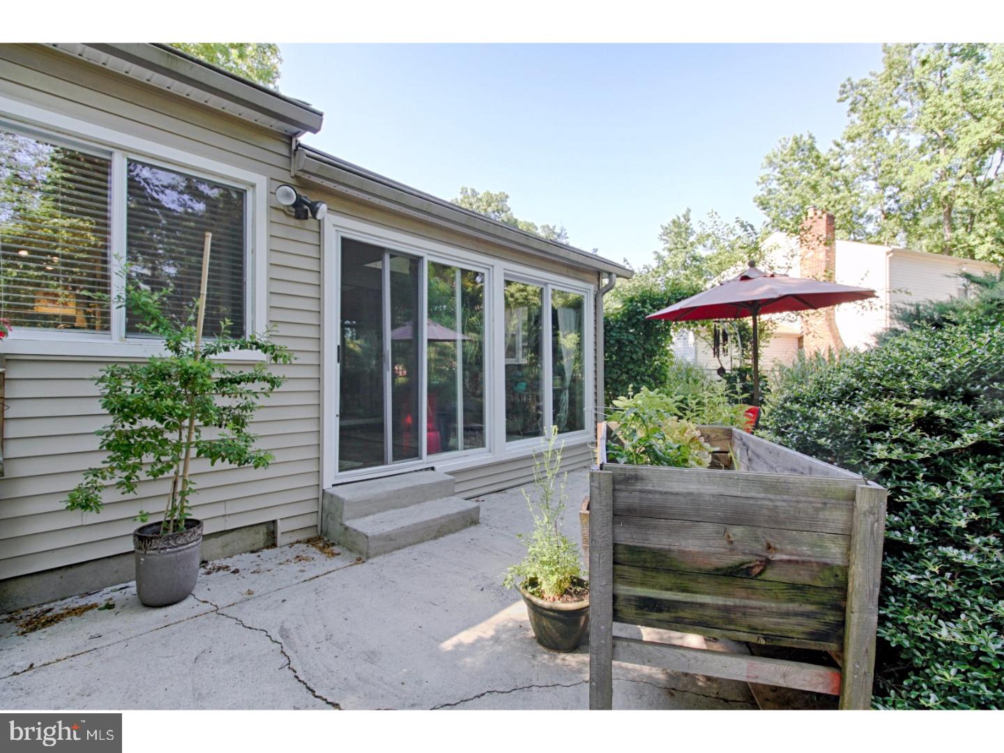 101 Greenvale Road Cherry Hill, NJ 08034 - Photo 22 of 25 a view of a house with sitting area and garden