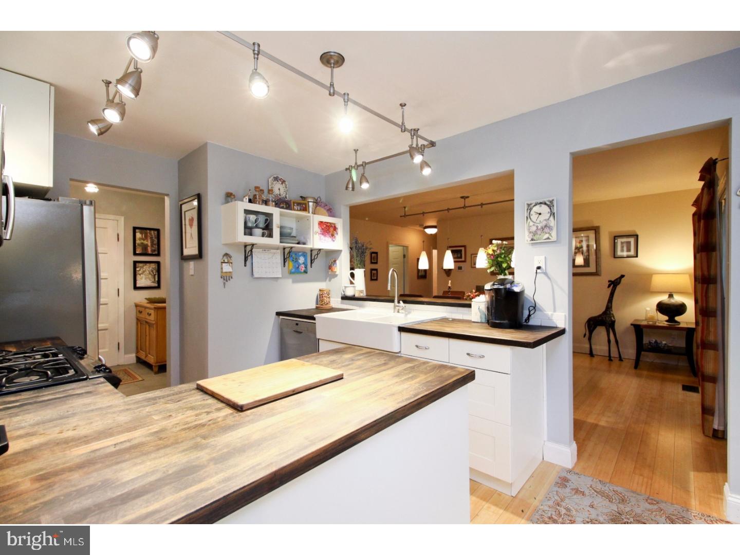 101 Greenvale Road Cherry Hill, NJ 08034 - Photo 6 of 25 a kitchen with refrigerator and chairs
