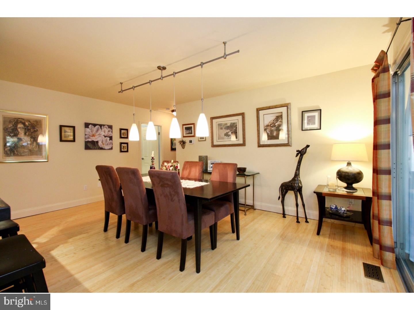 101 Greenvale Road Cherry Hill, NJ 08034 - Photo 9 of 25 a view of a dining room with furniture and wooden floor