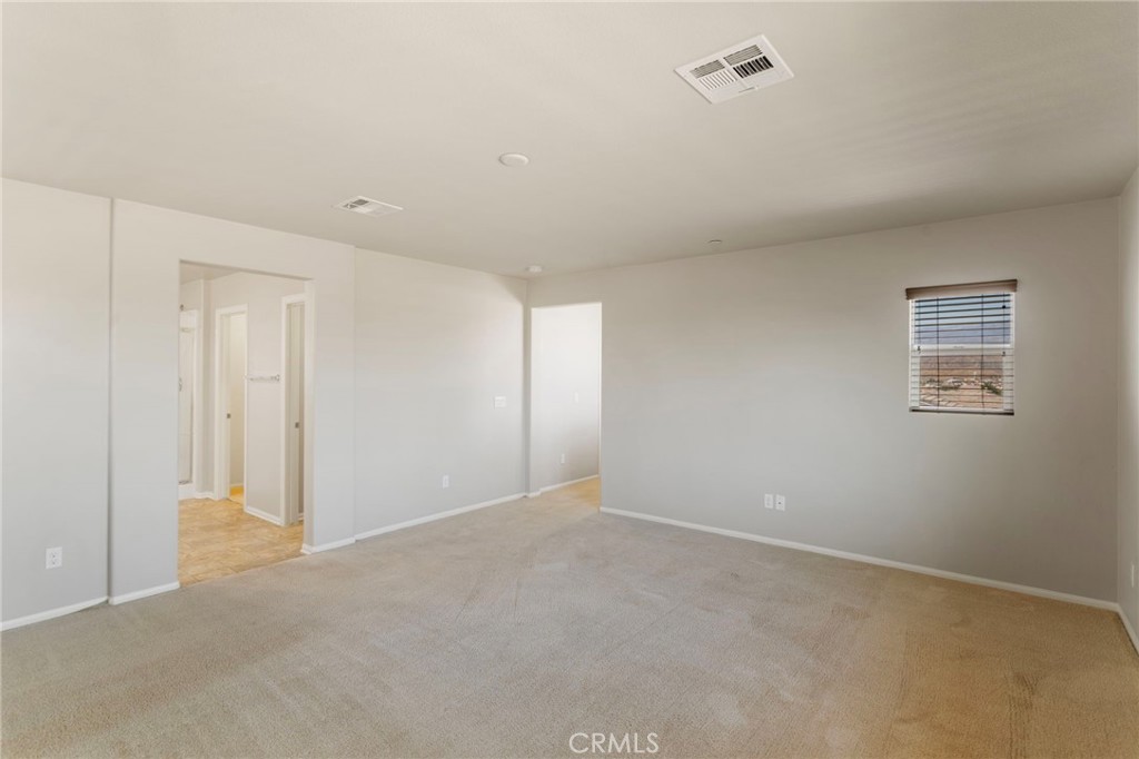 11462 Jacobsen Road Beaumont, CA 92223 - Photo 17 of 45 a view of an empty room