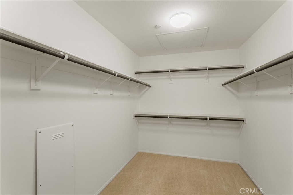 11462 Jacobsen Road Beaumont, CA 92223 - Photo 27 of 45 a view of a room with racks on the wall