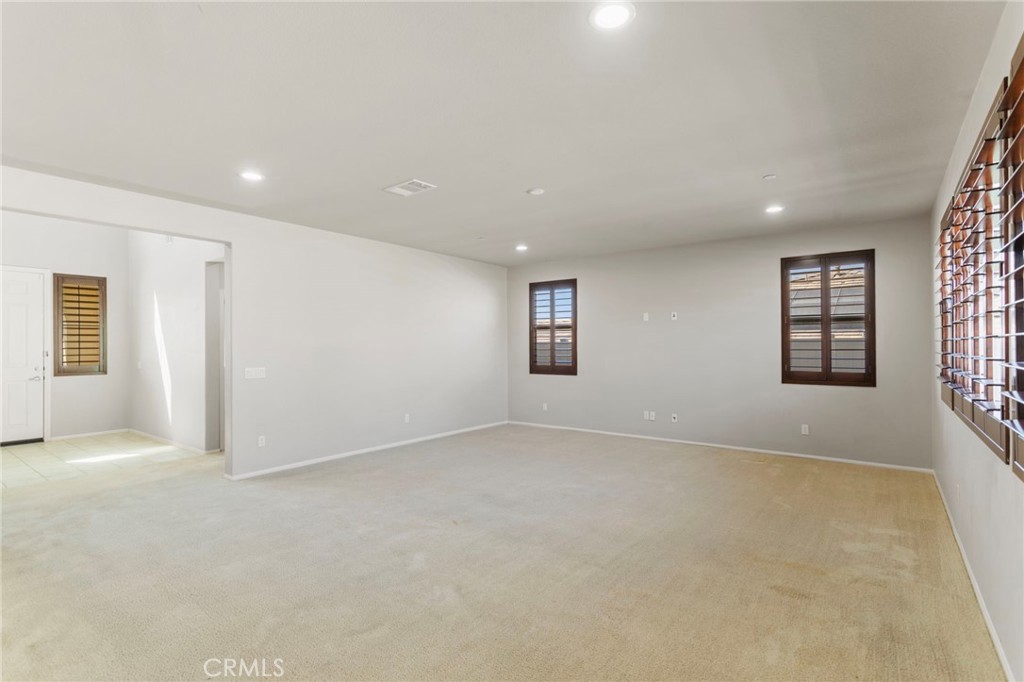 11462 Jacobsen Road Beaumont, CA 92223 - Photo 4 of 45 a view of an empty room with a window