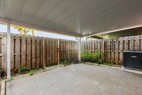 a view of a room with wooden walls