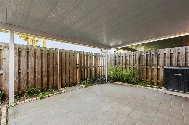 a view of a room with wooden walls