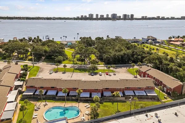 a view of a swimming pool with a lake view