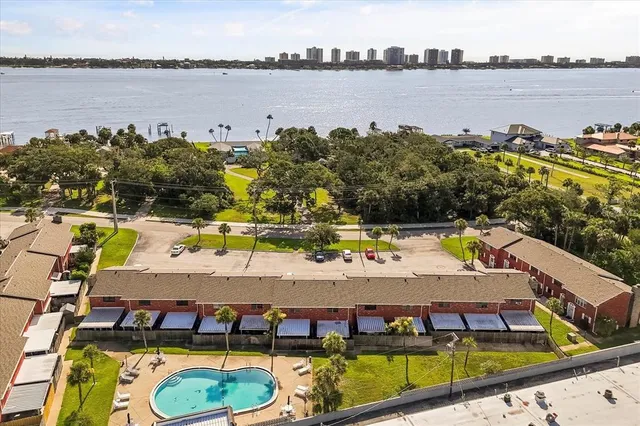 a view of a swimming pool with a lake view