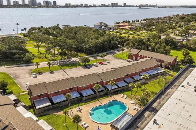 a view of a balcony with chairs and a table