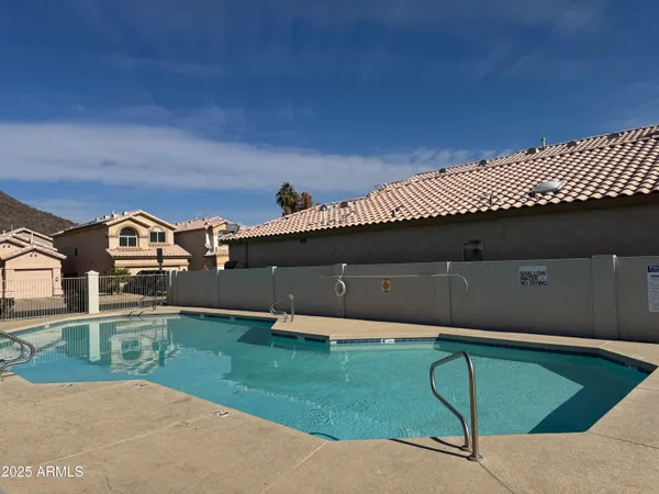 a front view of a house with a garage