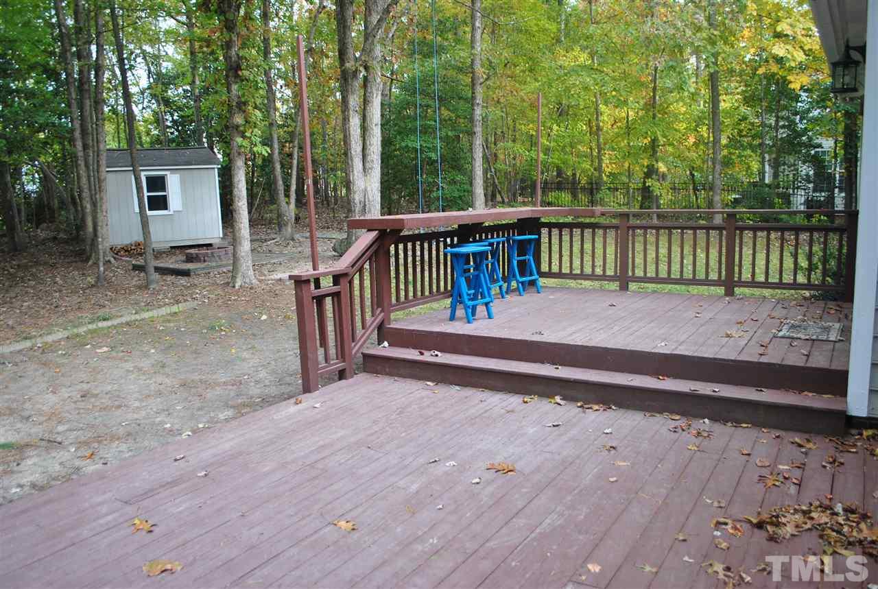 3424 Ribcowski Court Raleigh, NC 27616 - Photo 18 of 20 a view of a deck with a backyard