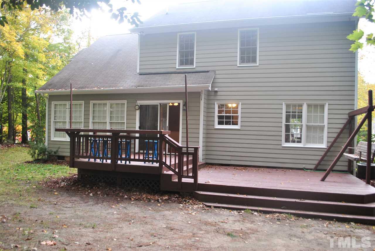 3424 Ribcowski Court Raleigh, NC 27616 - Photo 20 of 20 a view of a deck with chairs and a yard