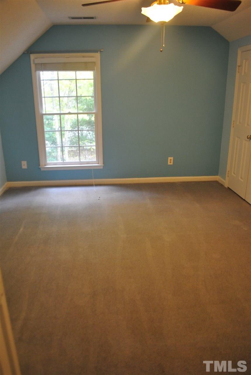 3424 Ribcowski Court Raleigh, NC 27616 - Photo 9 of 20 an empty room with a window