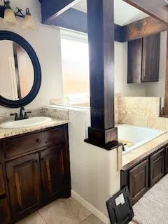 a bathroom with a double vanity sink and a mirror