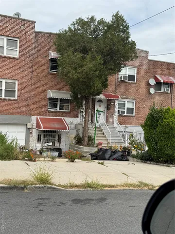 a front view of a building with street