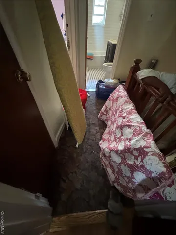 a room with furniture and a window