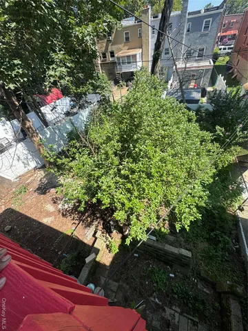 a picture of street with lots of trees