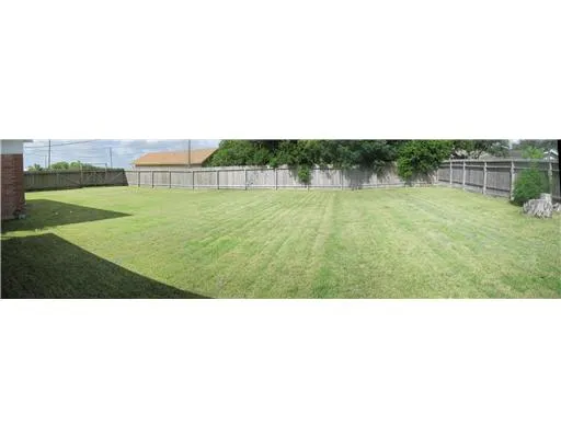 a view of an outdoor space and a yard