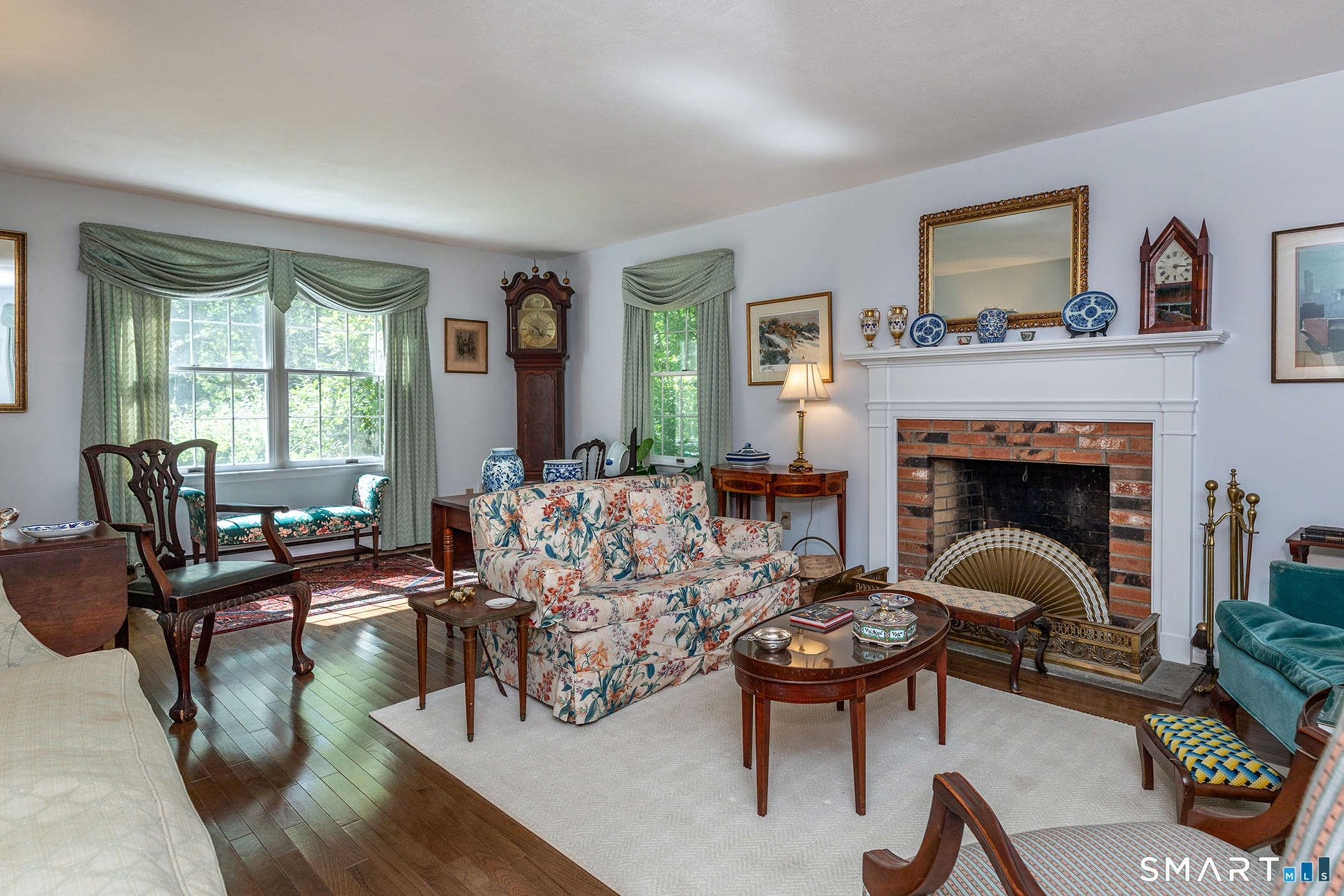 318 Romford Road Washington, CT 06777 - Photo 14 of 34 a living room with furniture and a fireplace