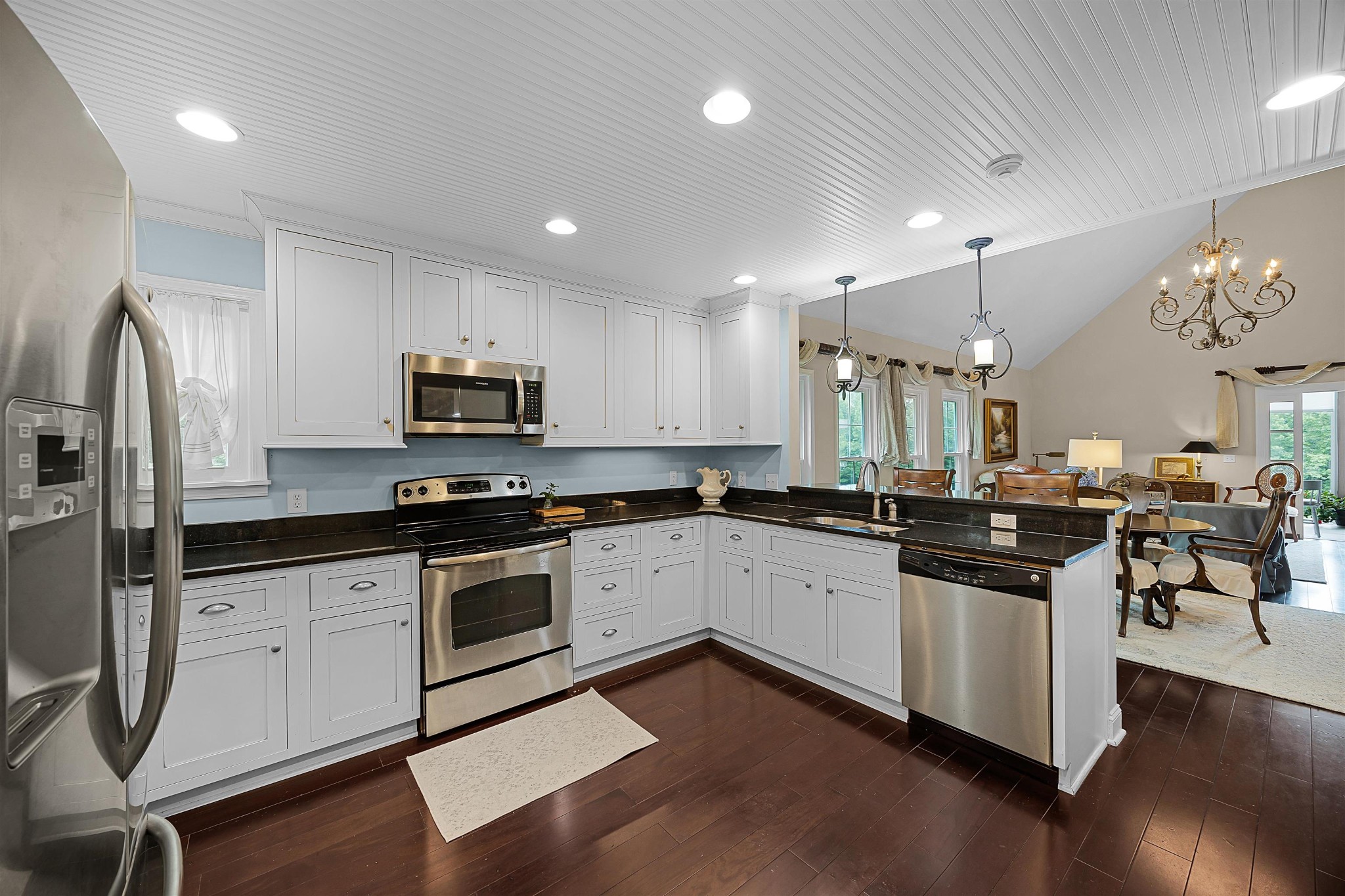 40 Vantage Pointe Counce, TN 38326 - Photo 8 of 25 a kitchen with granite countertop stainless steel appliances and wooden cabinets