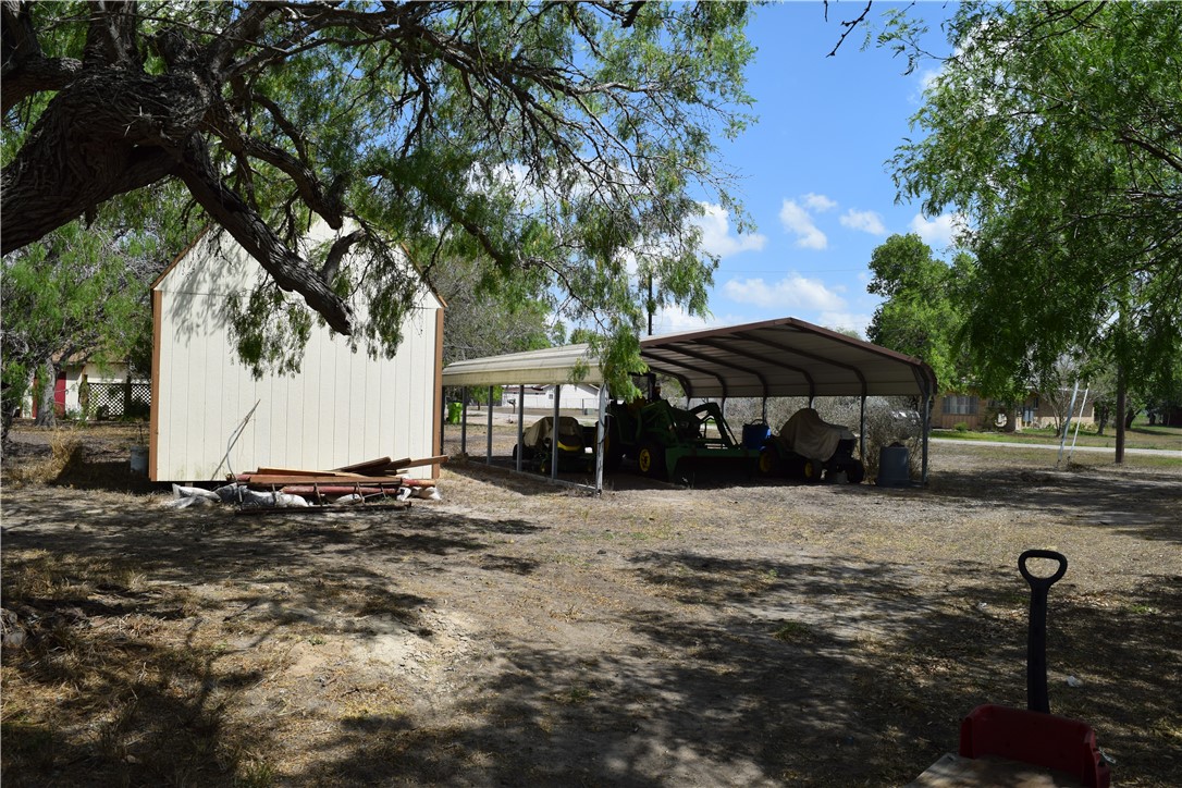 24772 County Road 360 Mathis, TX 78368 - Photo 22 of 30 a front view of a house with a yard