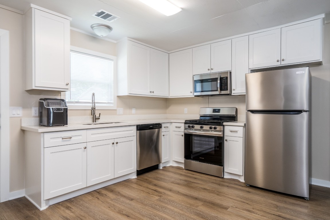 605 Hospital Street, Unit A Tomball, TX 77375 - Photo 2 of 15 Vinyl plank through out.. no carpet