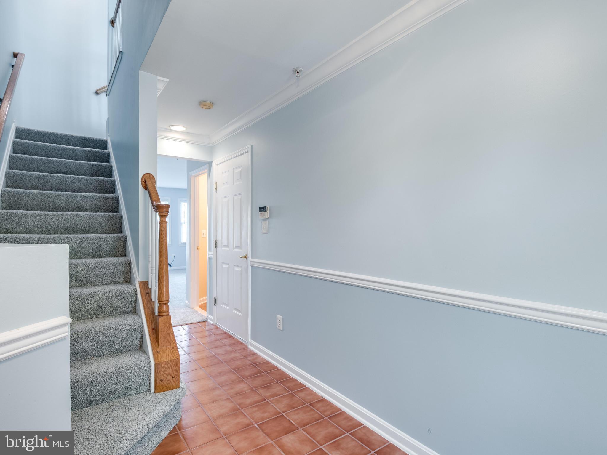 12108 Kinsley Place Reston, VA 20190 - Photo 4 of 27 Foyer