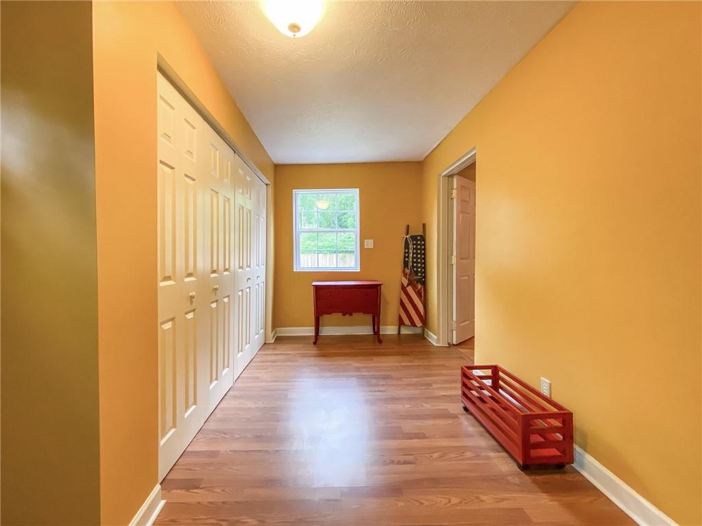 2022 Ridge Rd Extension Ambridge, PA 15003 - Photo 12 of 22 a living room with furniture and a table