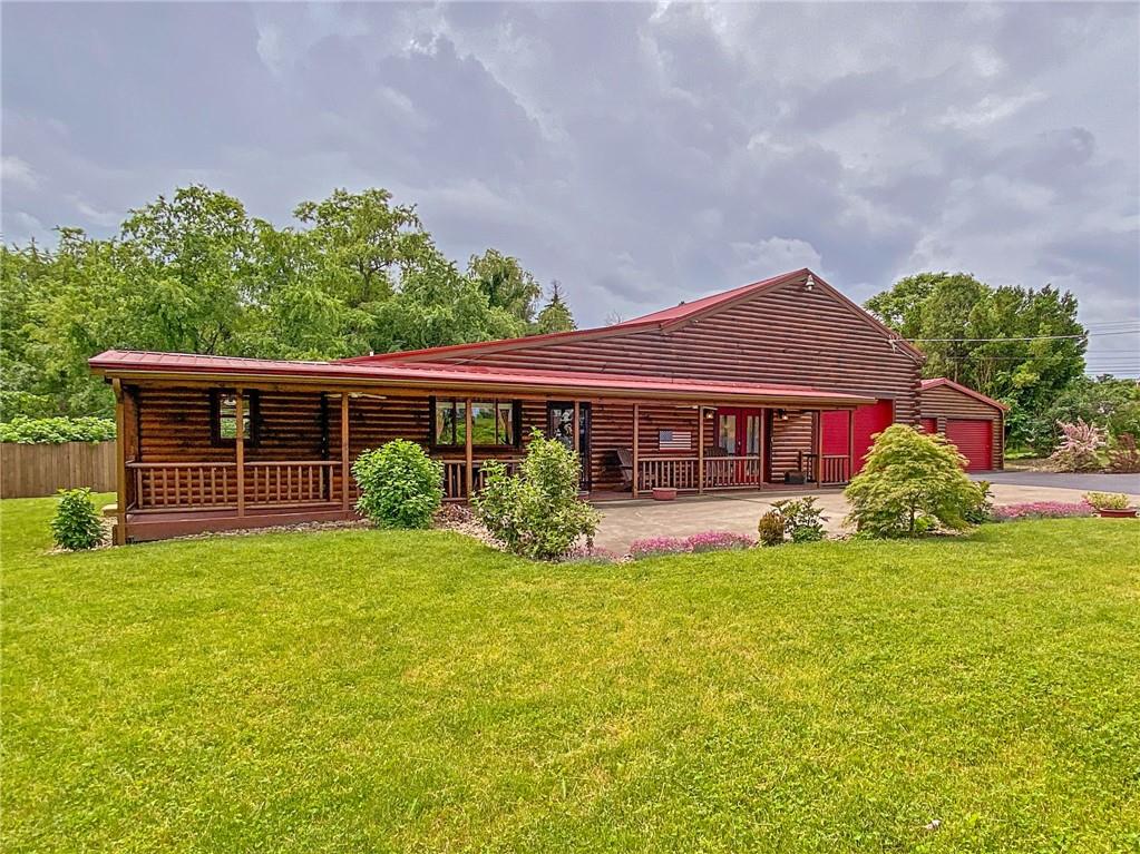 2022 Ridge Rd Extension Ambridge, PA 15003 - Photo 22 of 22 a view of a house with a yard porch and sitting area