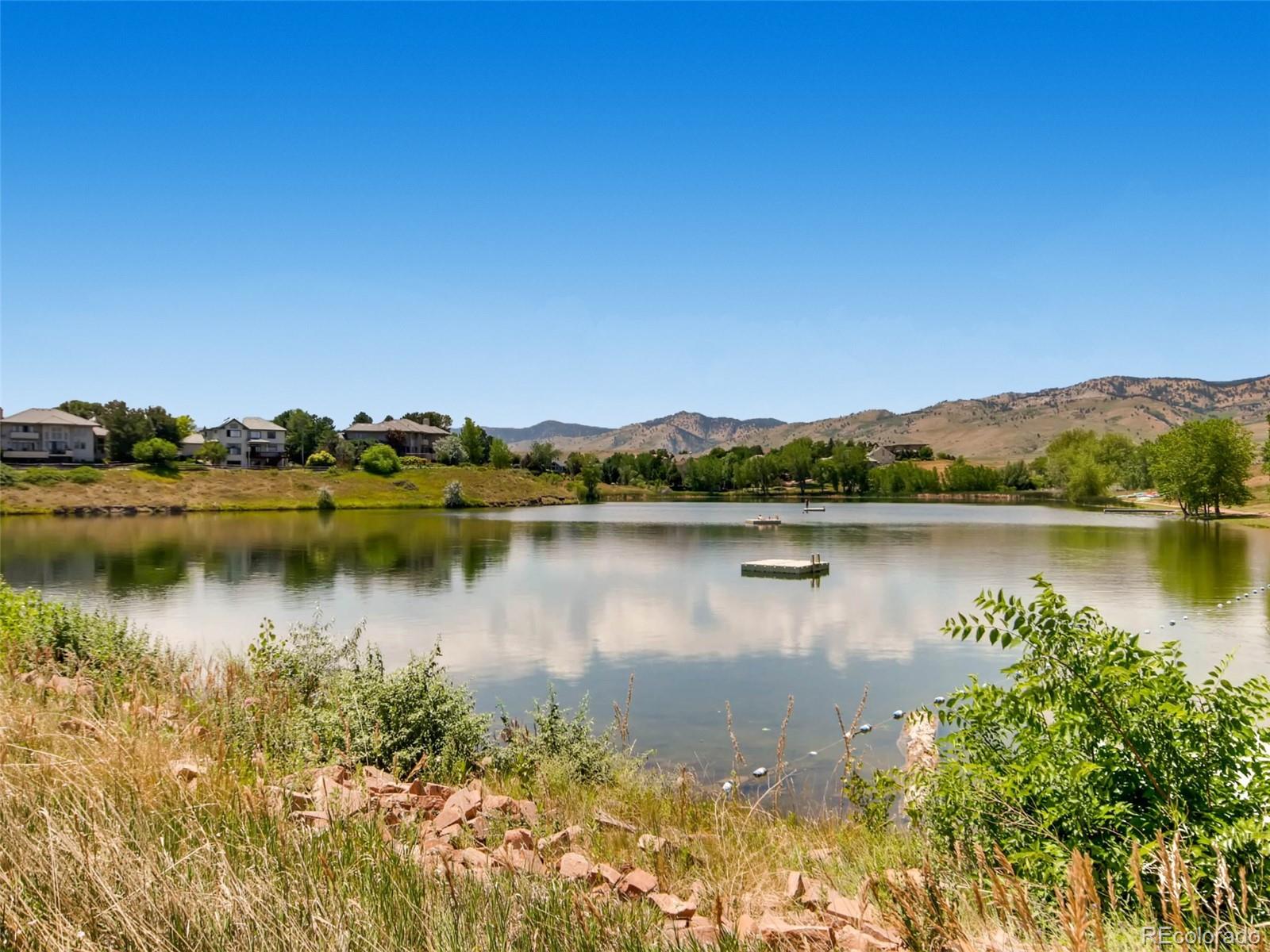6370 Eagle Court Longmont, CO 80503 - Photo 35 of 39 a view of a lake with a city