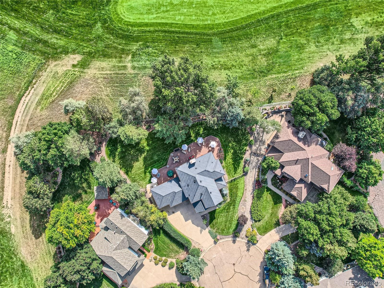 6370 Eagle Court Longmont, CO 80503 - Photo 39 of 39 an aerial view of residential house with outdoor space and trees all around