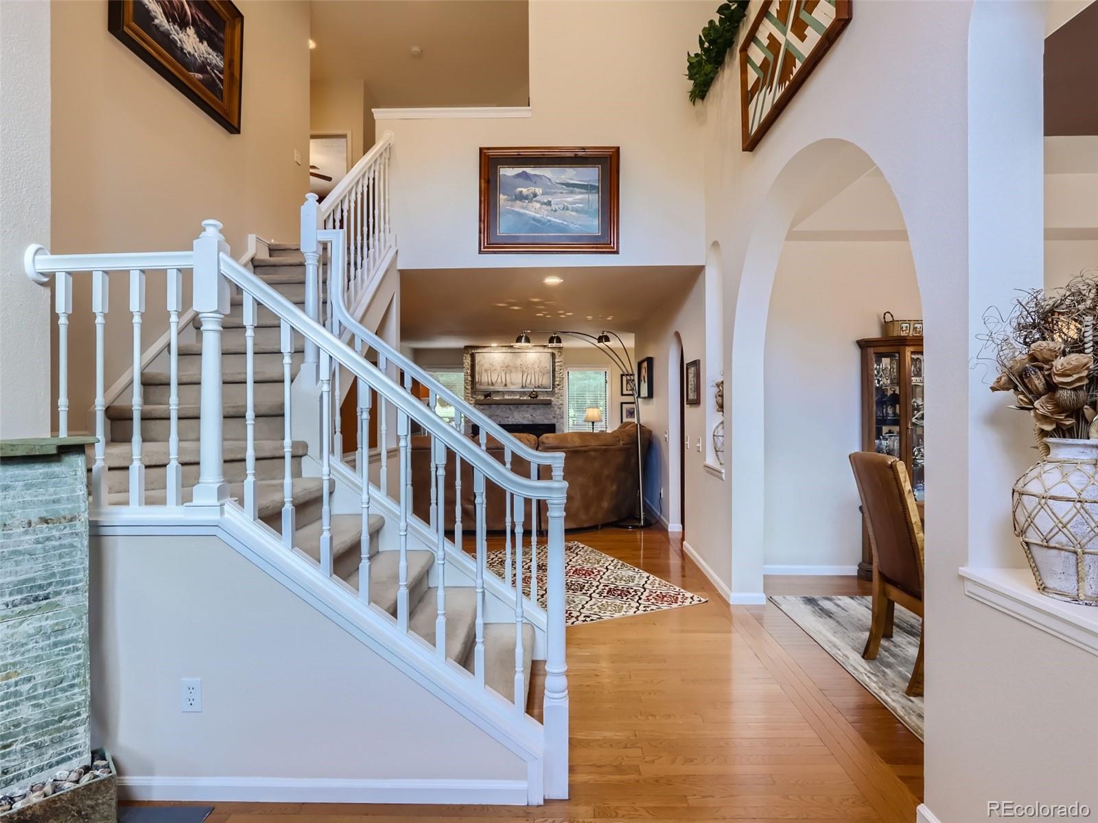 6370 Eagle Court Longmont, CO 80503 - Photo 4 of 39 a view of a livingroom with furniture and stairs
