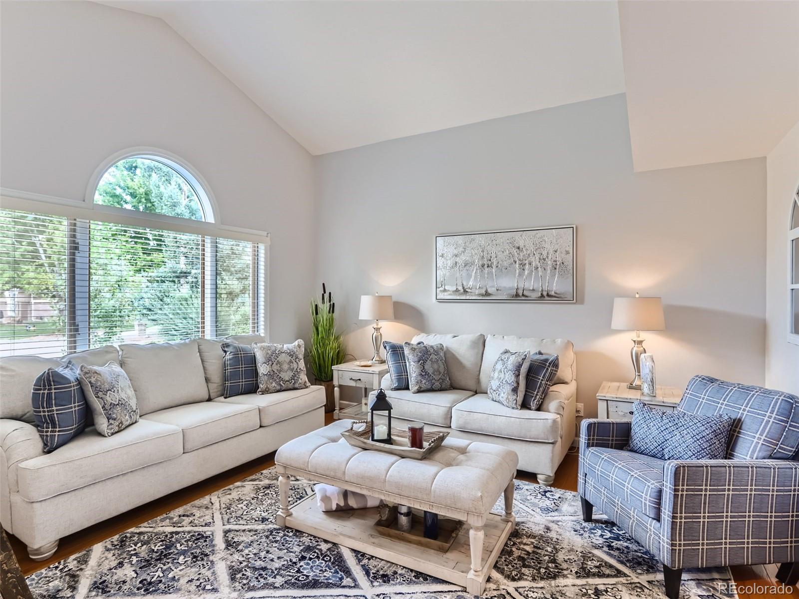 6370 Eagle Court Longmont, CO 80503 - Photo 5 of 39 a living room with furniture and a large window