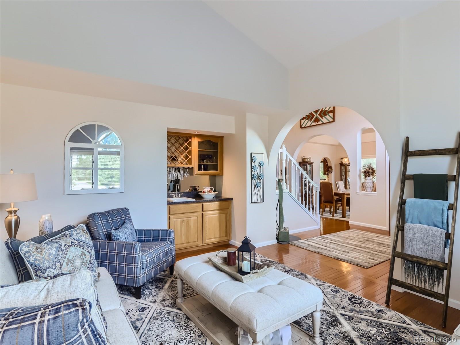 6370 Eagle Court Longmont, CO 80503 - Photo 6 of 39 a living room with furniture and wooden floor