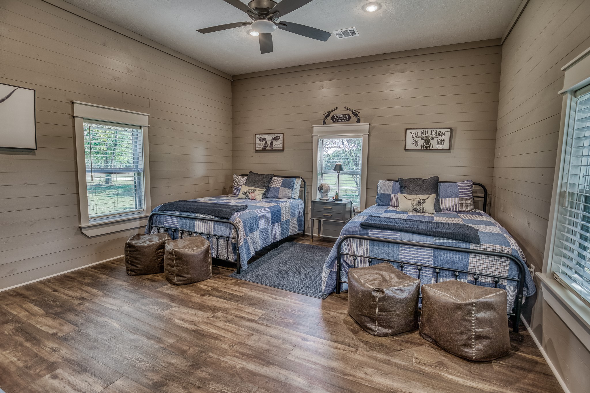 5344 Andert Road Bryan, TX 77808 - Photo 13 of 50 a bedroom with two beds and a window