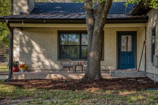 a view of house with a outdoor space