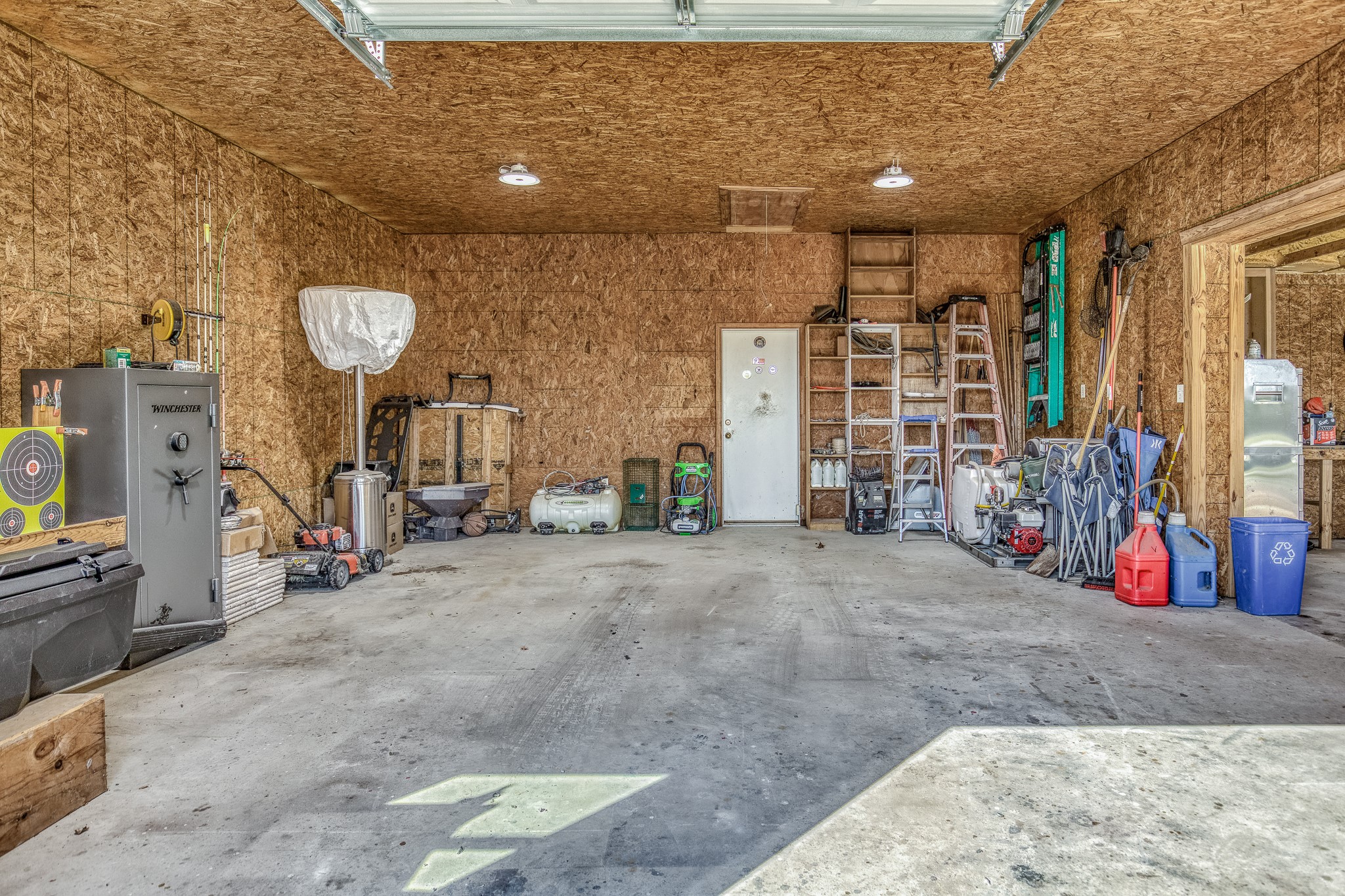5344 Andert Road Bryan, TX 77808 - Photo 24 of 50 a view of a garage with rack and bicycle