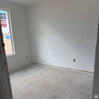 4957 North 970th East Enoch, UT 84721 - Photo 7 of 10 Unfurnished room featuring concrete floors